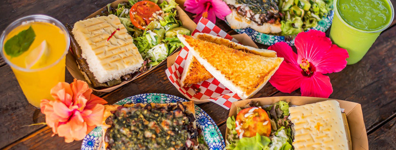 pizzas, paninis, garlic bread, side salads, and cold drinks