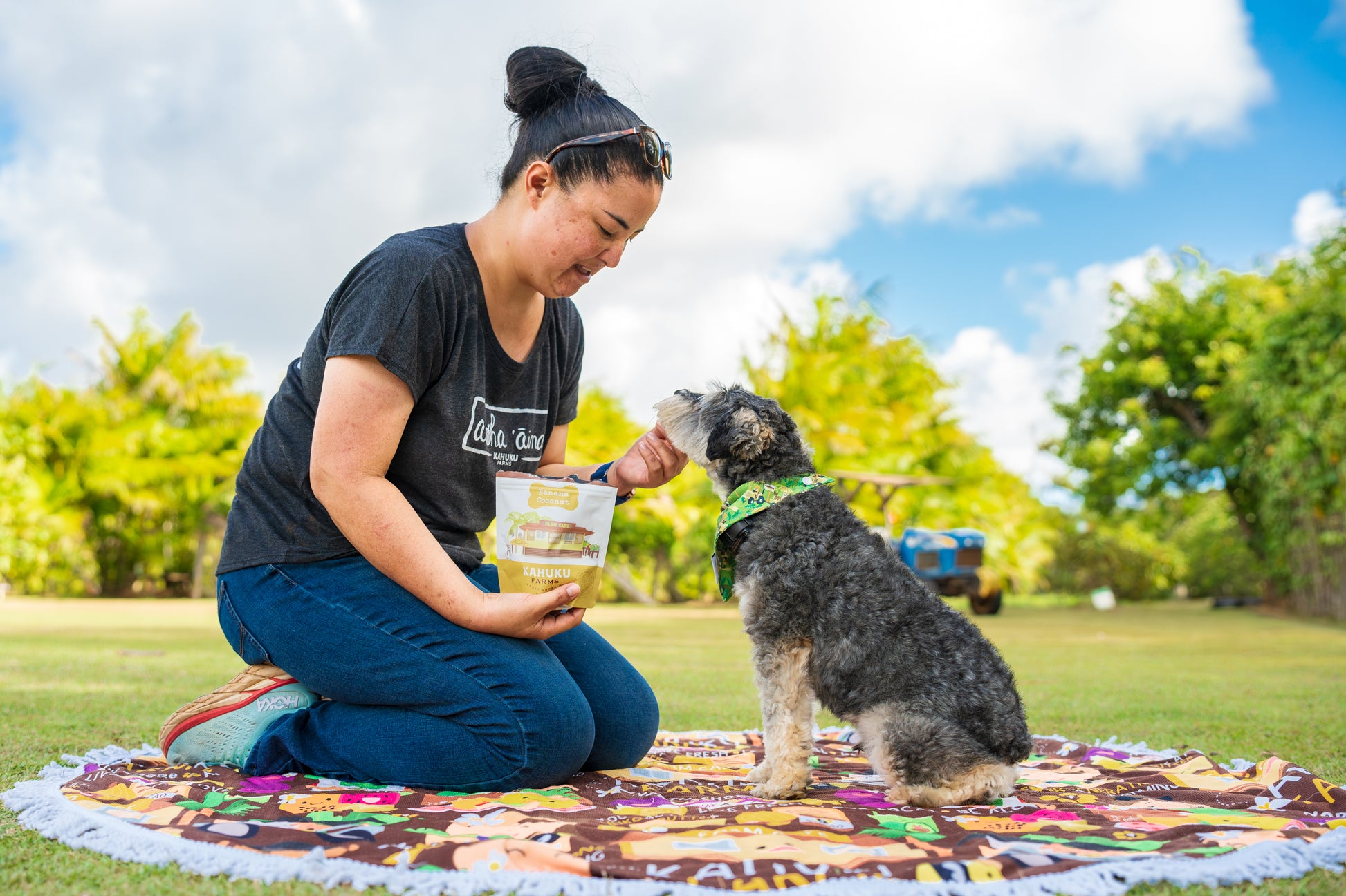 woman feeding dog banana coconut dog treats