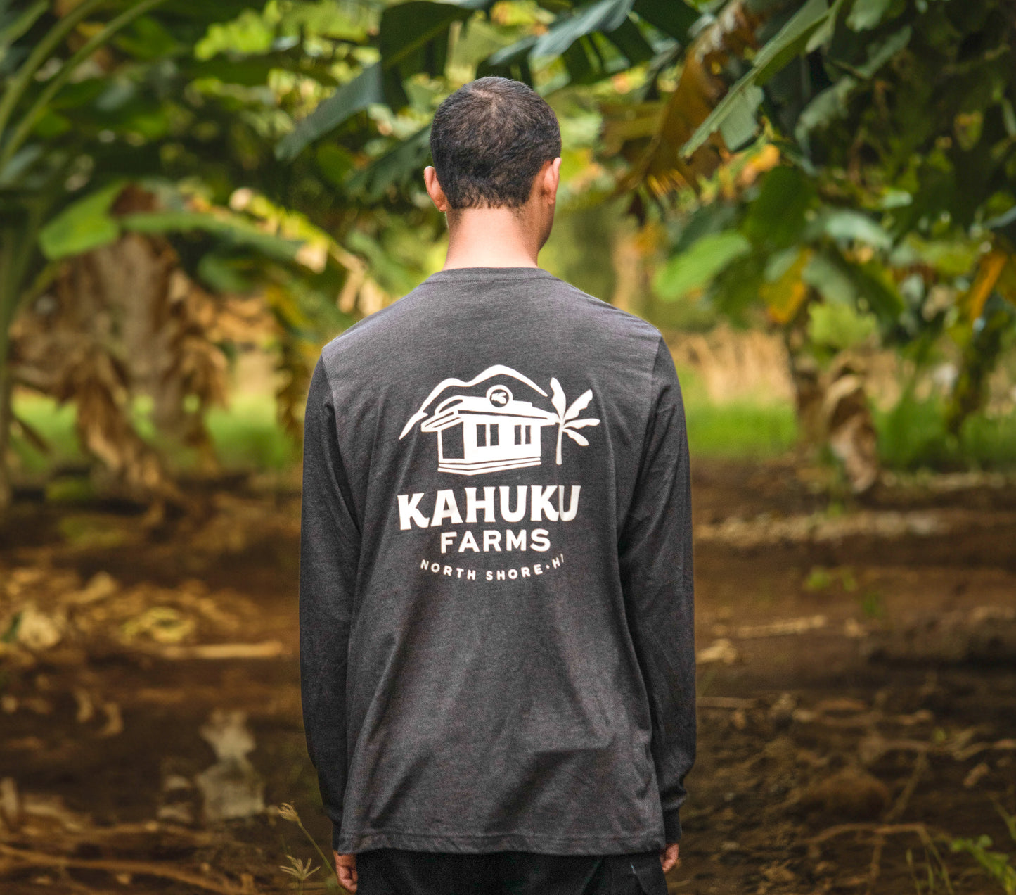 man modeling back of charcoal grey kahuku farms long sleeve shirt